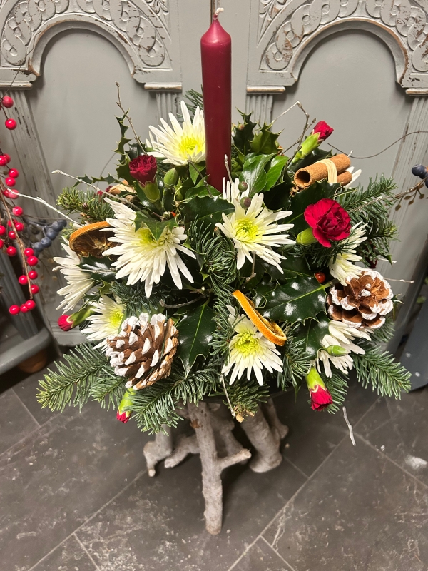 Christmas Round Table Arrangement With Candle