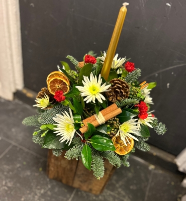 Christmas Round Table Arrangement With Candle